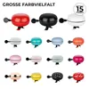 A collage of various bicycle bells in different colors and patterns. Produktbild-Vorschau