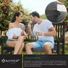 A couple enjoying a moment on a garden bench outdoors. Produktbild-Vorschau