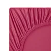 A close-up view of a fitted sheet with elastic gathering. Produktbild-Vorschau