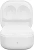 An open white charging case for wireless earbuds, showing the empty interior slots for the earbuds and a small LED indicator light on the front. Podgląd zdjęcia produktu