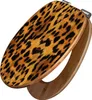 A toilet seat with a leopard print design and a bamboo base. Produktbild-Vorschau