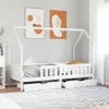 A white wooden house-shaped bed frame with two drawers underneath, set up in a child's bedroom with abstract art on the wall. Náhled obrázku produktu