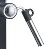A close-up of a coffee machine's steam wand and portafilter holder. Produktbild-Vorschau