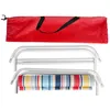 A folded camping chair and its carrying bag are displayed against a white background. Produktbild-Vorschau