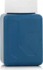A close-up studio shot of a small, square blue bottle with a white cap. Podgląd zdjęcia produktu