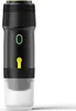 A black and white portable coffee maker with yellow and green accents, shown against a white background. Náhled obrázku produktu