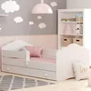 A child's bedroom with a bed, bookshelf, and wall decorations. Produktbild-Vorschau