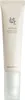 A close-up studio shot of a white squeeze tube of eye serum. Voir les images du produit