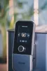 Close-up of a coffee machine's touchscreen interface with various drink options. Produktbild-Vorschau
