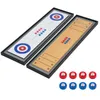 Two tabletop game boards, one for shuffleboard and one for curling, are shown with their respective playing pieces. The boards are laid out diagonally on a white background. Below the boards, there are eight pucks, four red and four blue. Produktbild-Vorschau