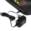 A close-up view of a black electronic device with a power adapter and cable. Produktbild-Vorschau