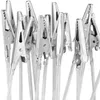 A close-up, tightly cropped shot of multiple silver alligator clips attached to thin wires, against a white background. Produktbild-Vorschau