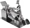 A metal sculpture of a gynecologist examining a pregnant woman during an ultrasound. Anteprima dell’immagine prodotto