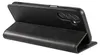 A black leather flip case for a smartphone is shown from the side, with the phone inserted and the cover folded back to act as a stand. Produktbild-Vorschau