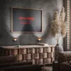 A living room or lounge area with a TV on the wall, a wooden cabinet, and decorative plants. Anteprima dell’immagine prodotto