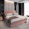 A bedroom scene with a pink upholstered bed as the main focus. Produktbild-Vorschau