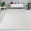 Tapis blanc aspect peau de lapin élégant et doux avec un Voir les images du produit 1