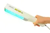 A hand holding a white UV light therapy device with blue light emitting from the front. Anteprima dell’immagine prodotto