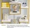 A bookshelf with decorative items and books. Produktbild-Vorschau