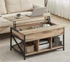 A lift-top coffee table with storage, shown in a living room setting with a laptop and cup on top. Produktbild-Vorschau