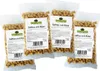 Four bags of Schecker dog treats with cheese flavor are arranged in a staggered formation against a white background. Produktbild-Vorschau