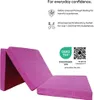 A pink foldable mattress is shown with text and certifications about safety and material testing. Anteprima dell’immagine prodotto
