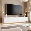 A modern living room with a TV stand, TV, and decorative items. Náhled obrázku produktu