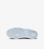 The underside of a white and green sneaker is shown against a white background. Anteprima dell’immagine prodotto