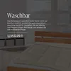 A bed with a comforter on it, with text overlay describing its washability. Produktbild-Vorschau