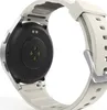 The back of a smartwatch with a white strap. Produktbild-Vorschau