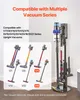 A marketing image showing a vacuum stand with multiple Dyson vacuum models and accessories. Voir les images du produit