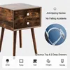 A product image of a nightstand with text overlays highlighting features and benefits. Náhled obrázku produktu