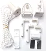 A collection of white plastic parts for window blinds, including a bead chain, brackets, and a roller mechanism, laid out on a white background. Produktbild-Vorschau