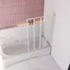 A bathtub with a folding shower screen installed. Produktbild-Vorschau