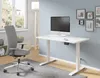 A modern office setup with a height-adjustable desk, computer, and chair. Podgląd zdjęcia produktu