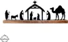 A silhouette of a nativity scene on a wooden base. Voir les images du produit