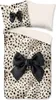 A duvet cover and pillowcase set with a leopard print and black bows, laid out flat.