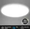A round, white LED ceiling light with a glowing effect, mounted on a light gray ceiling. Text and icons are present at the bottom of the image. Náhľad obrázku produktu