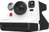 A white and black Polaroid instant camera is shown against a white background. Voir les images du produit