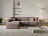 A modern sectional sofa in a living room setting. Produktbild-Vorschau