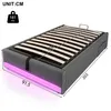 A grey upholstered bed frame with LED lighting at the base, shown from a diagonal angle. Produktbild-Vorschau