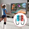 A woman is playing a video game on a large TV, holding Nintendo Switch controllers. A close-up of the controllers is shown in a circular inset. Produktbild-Vorschau