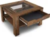 A square coffee table with a glass top and a pull-out drawer is shown against a white background. Náhled obrázku produktu