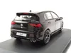 A black Volkswagen Golf R model car is displayed on a black stand against a white background. Produktbild-Vorschau