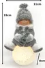 Winterkind Mädchen auf LED Schneeball 19cm Dekofigur Produktbild-Vorschau 5
