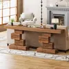A console table is placed behind a sofa in a living room, with a fireplace and armchair in the background. Anteprima dell’immagine prodotto