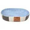 A ceramic oval washbasin with a speckled blue interior and a striped exterior in brown, white, and brown. Produktbild-Vorschau