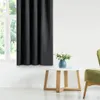 A living room scene with a window, curtains, a coffee table with a vase of flowers, and a chair. Produktbild-Vorschau
