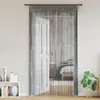 A room interior with a doorway covered by a string curtain, revealing a bedroom. Náhľad obrázku produktu
