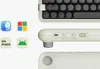 A close-up view of a retro-style mechanical keyboard, showing its side and top, along with compatibility icons for different operating systems. Produktbild-Vorschau